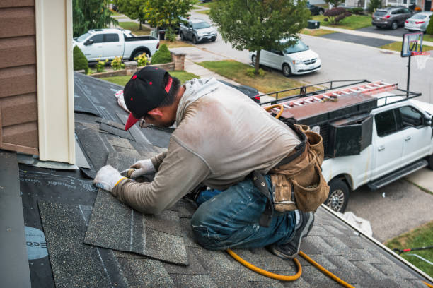 Professional Flat Roof Repair technician working in Fredericksburg, IA